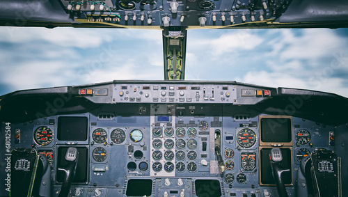 Tableau sur toile Aircraft dashboard. View inside the pilot's cabin.