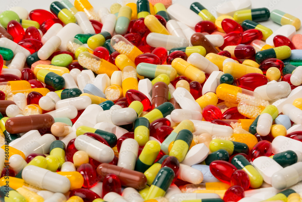 various pills and capsules as background various pills and capsules as background