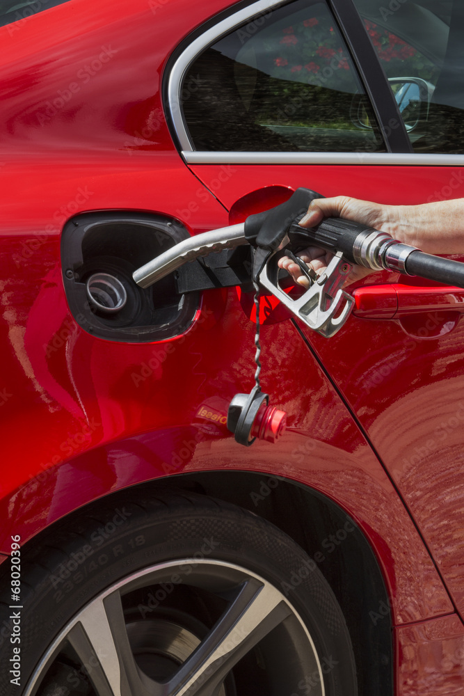 Pumping Gas - Filling a car with fuel Pumping Gas - Filling a car with fuel