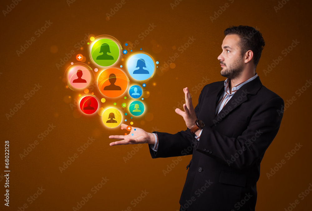 Social network icons in the hand of a businessman Social network icons in the hand of a businessman