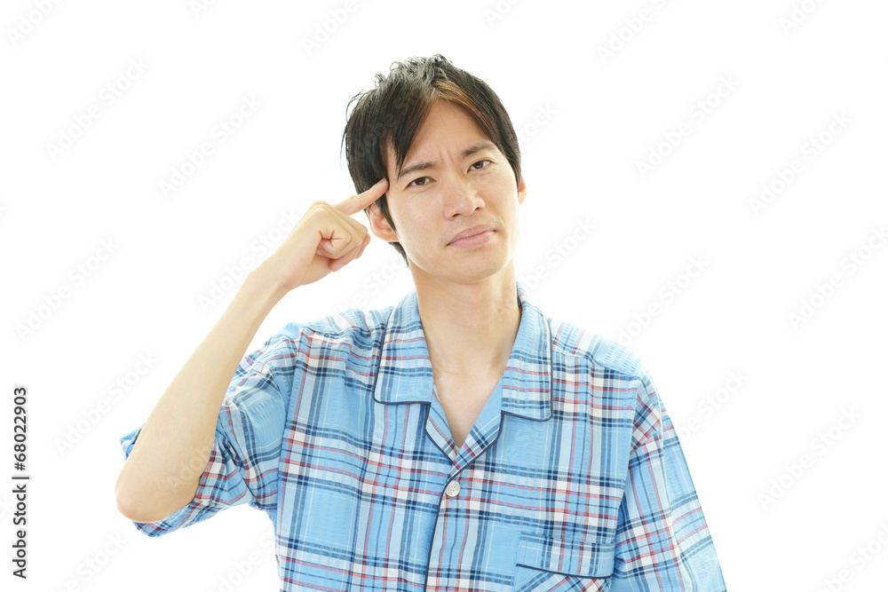 疲れた表情の男性 疲れた表情の男性