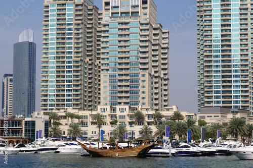Dubai Marina with boat against skyscrapers in Dubai, UAE © Tomas Marek