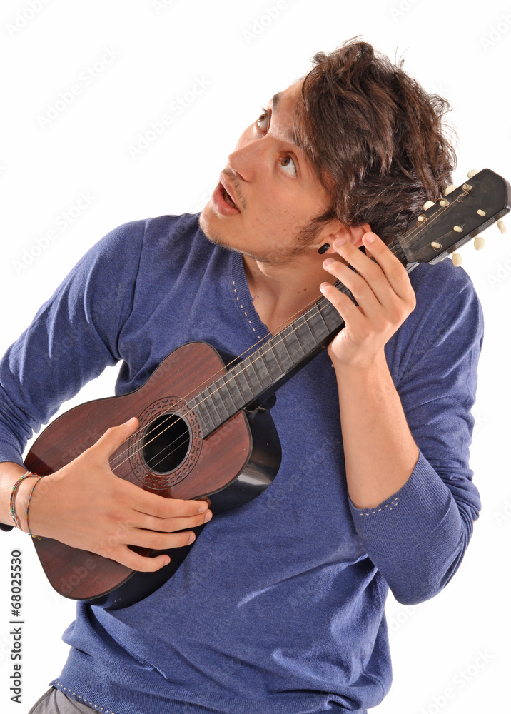 Obraz premium Afinando mi guitarra.