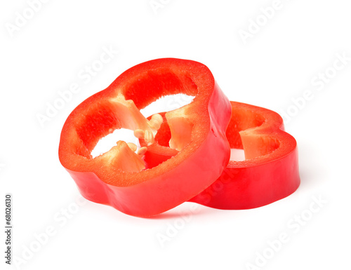 red pepper slices on white background photo