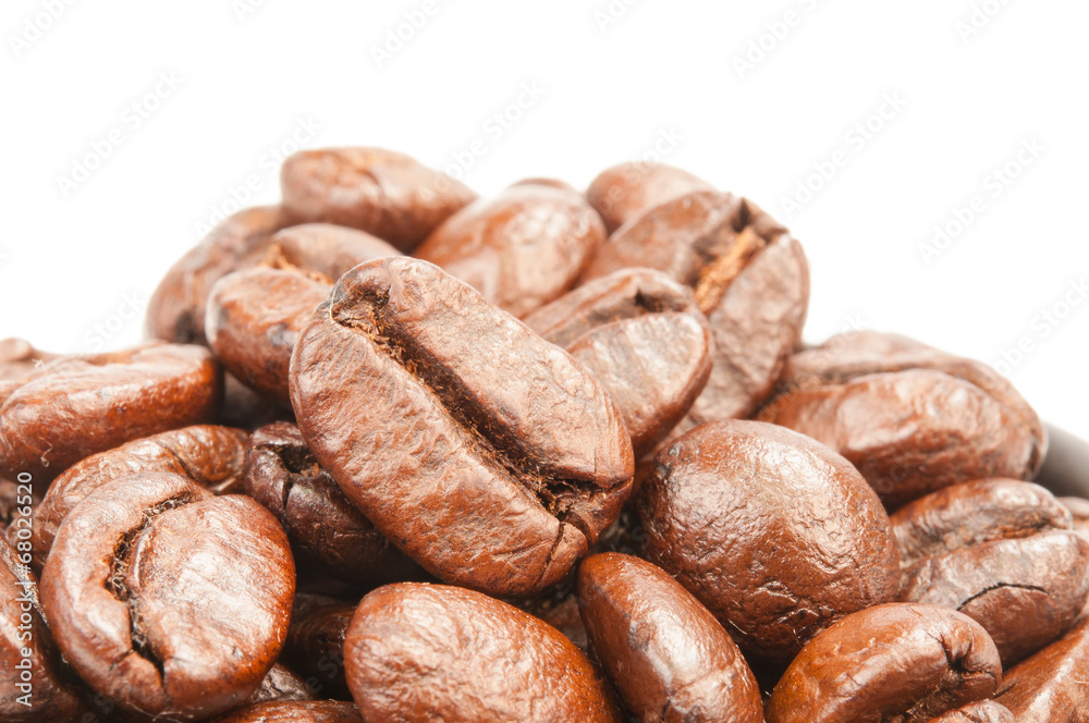 roasted coffee beans isolated on white background. roasted coffee beans isolated on white background.