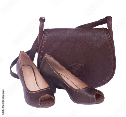 brown female bag with shoes and scarf