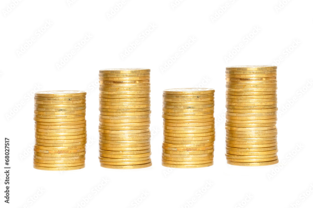 Savings, increasing columns of gold coins isolated on white back Savings, increasing columns of gold coins isolated on white back