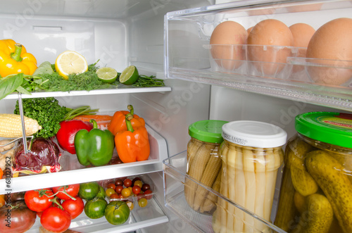 Different food products inside a refrigerator