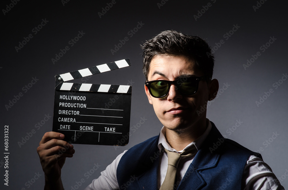 Funny man with movie clapboard Funny man with movie clapboard