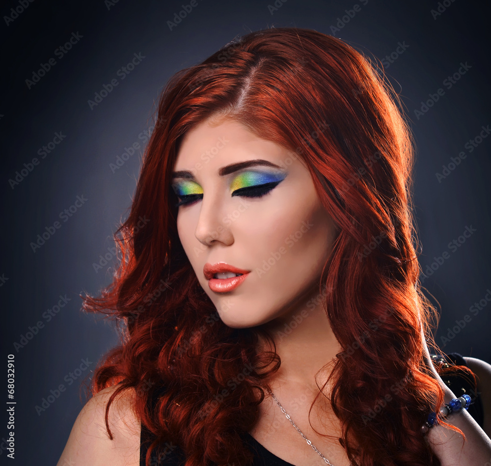 Close up of a woman with creative colorful make up Close up of a woman with creative colorful make up