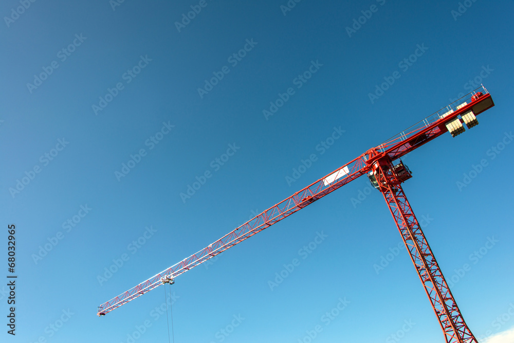 Construction crane on bright summer day