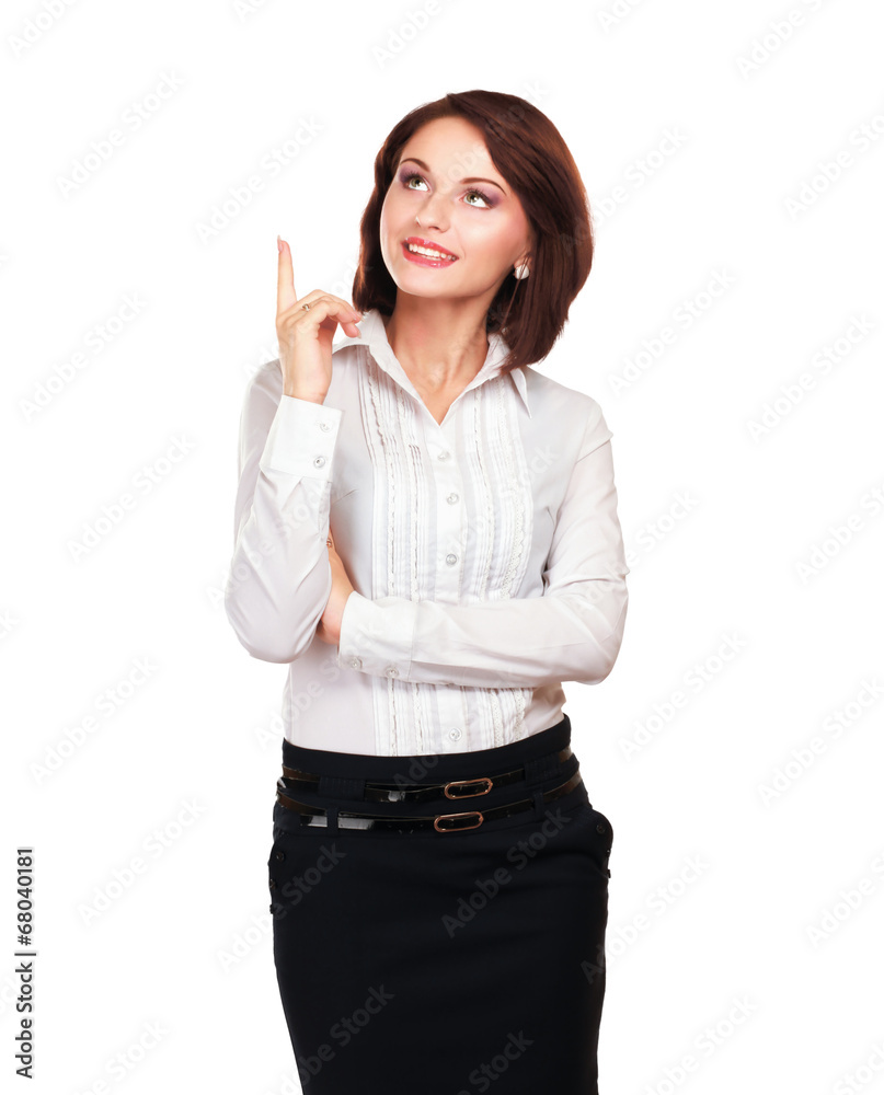 Portrait of a smiling young woman pointing up Portrait of a smiling young woman pointing up