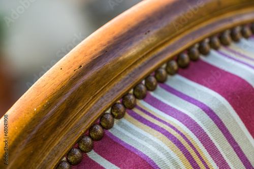 Принти на полотні closeup of upholstery tacks on an old traditional wooden chair