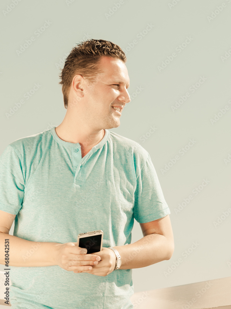 handsome man with mobile phone smartphone handsome man with mobile phone smartphone