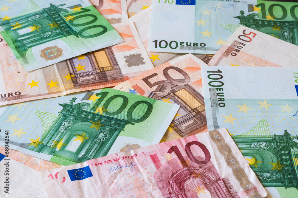 A pile of different Euro banknotes for business and finance A pile of different Euro banknotes for business and finance