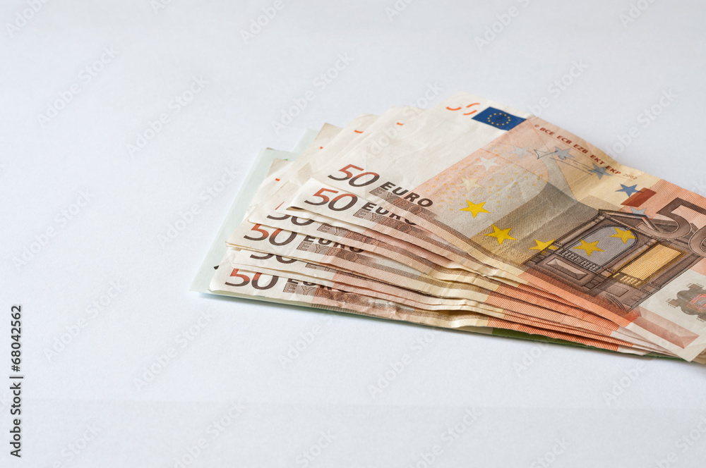 Pile of money Euros isolated on white for business and finance Pile of money Euros isolated on white for business and finance