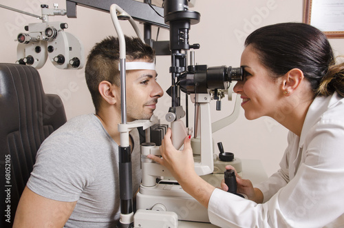 Optical exam to young man  professional woman