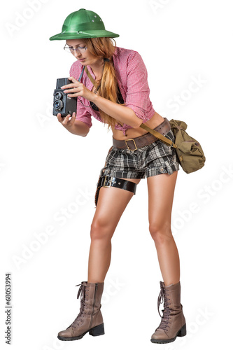 Foto woman with vintage camera on white background