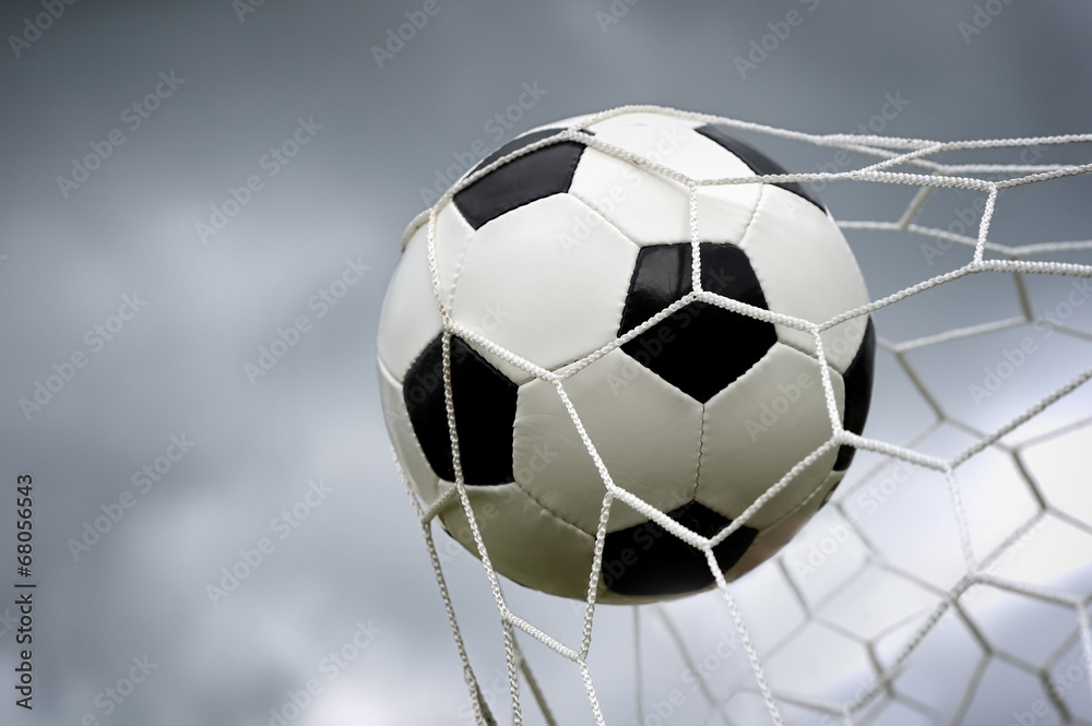 Fototapeta premium Soccer ball in goal