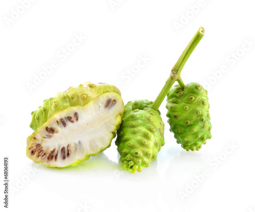 Noni fruits on white isolated background photo