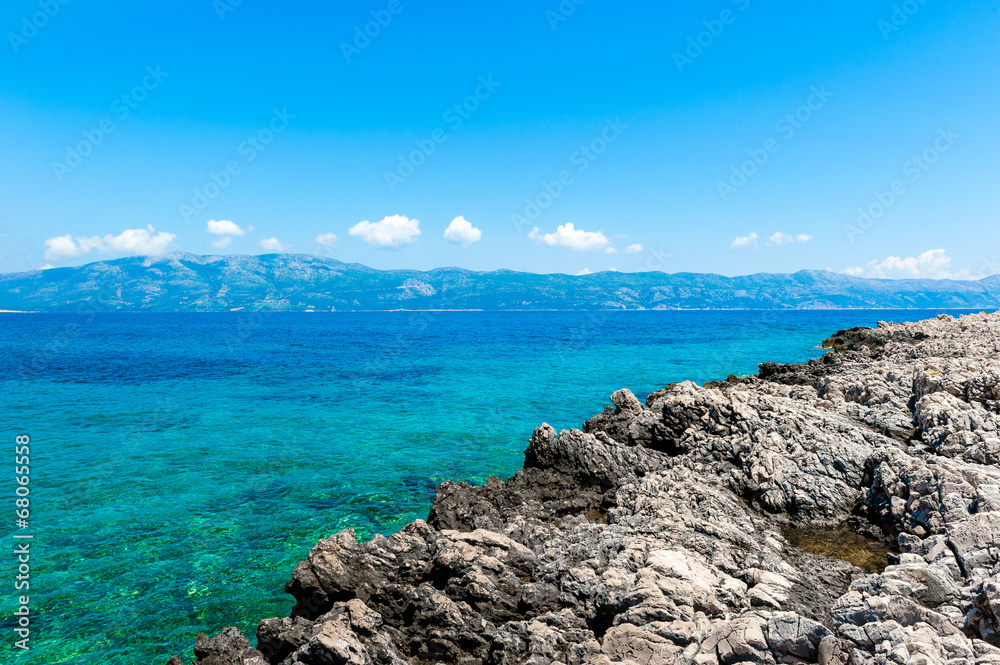 Rocky coast of Korcula on the Adriatic Sea in Croatia Rocky coast of Korcula on the Adriatic Sea in Croatia