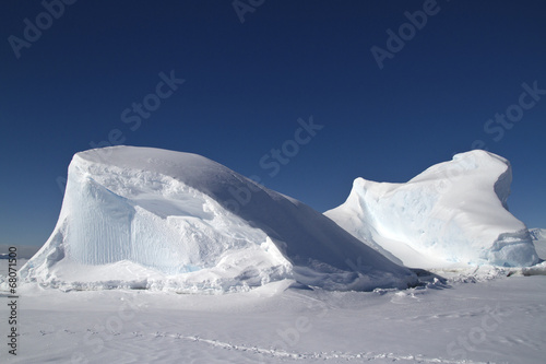 Iceberg frozen in the ocean off the Antarctic Peninsula in winte