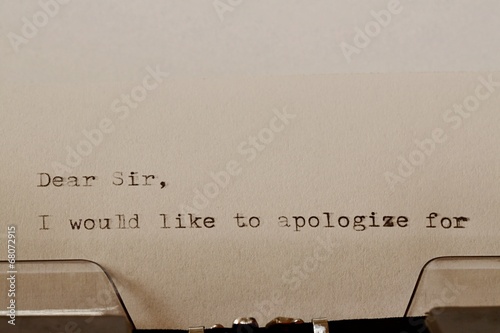 Text Dear Sir typed on old typewriter