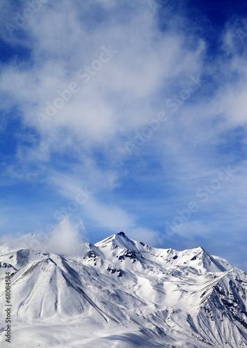 Winter snowy mountains at windy day © BSANI