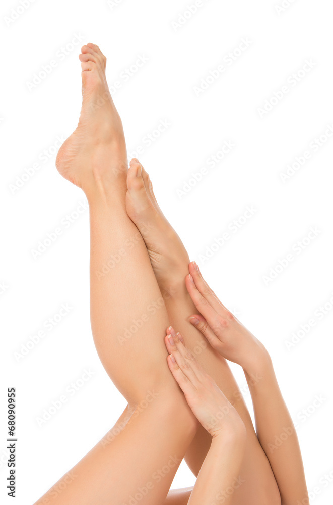 Beauty and skin care concept hands and legs with french manicure Beauty and skin care concept hands and legs with french manicure