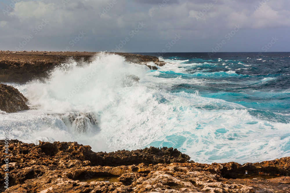 Waves splashing on rocks Bonaire Waves splashing on rocks Bonaire