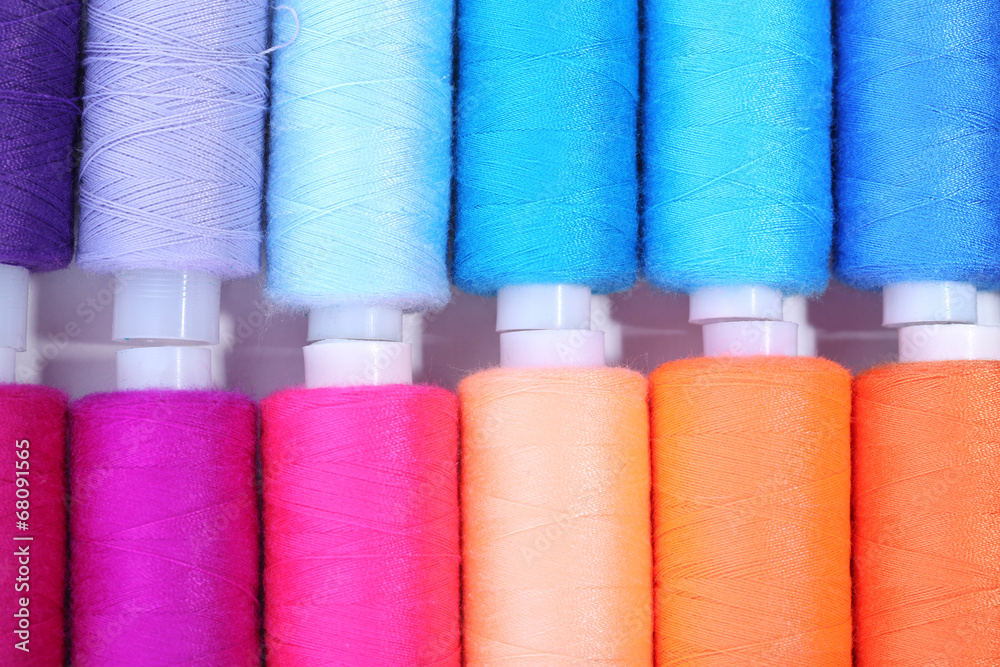 Multicolor sewing threads background Multicolor sewing threads background