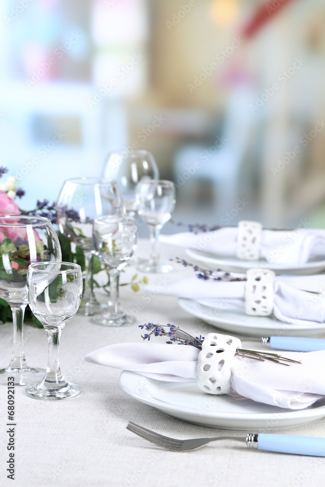 Dining table setting with lavender flowers Dining table setting with lavender flowers