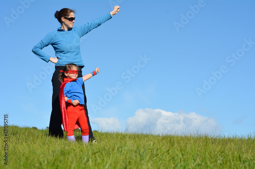 Superhero mother and child - girl power