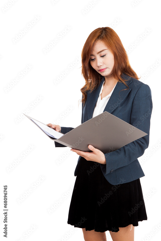 Asian office girl read data on folder Asian office girl read data on folder