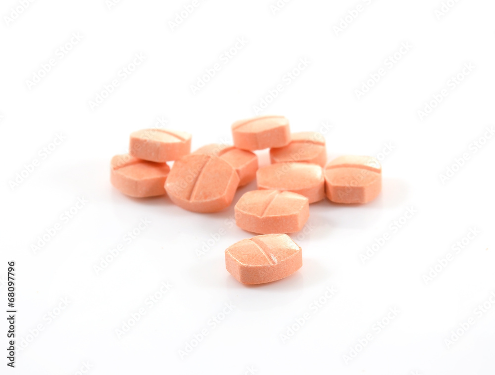pill of vitamin C on white background pill of vitamin C on white background