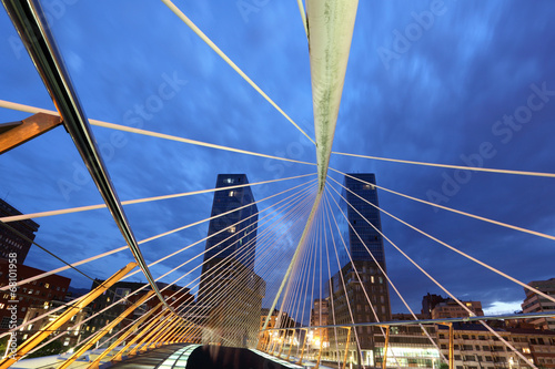 Pedestrian bridge over Nervion river in Bilbao. Spain photo