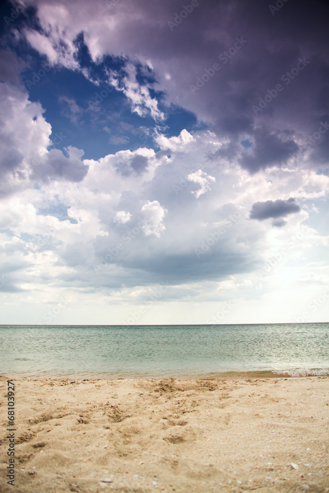 Fototapeta premium Sea sand and clouds