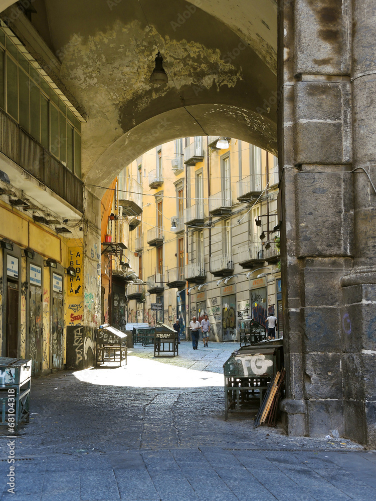 arch and street in old city of Naples, Italy