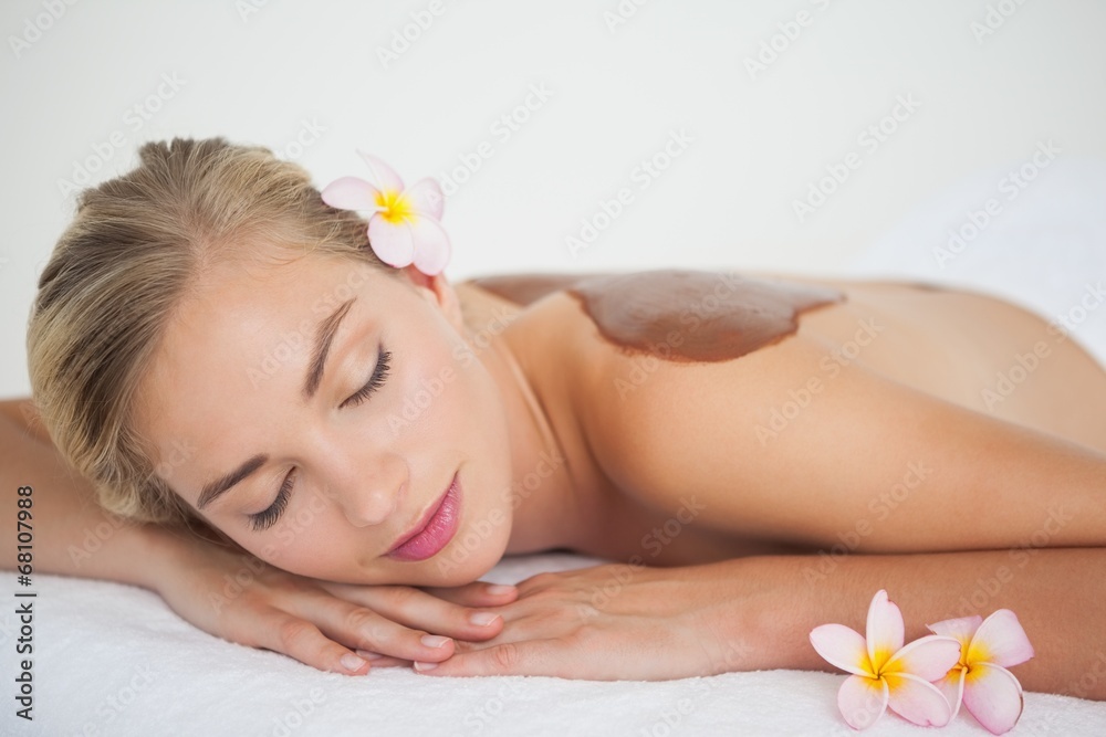 Beautiful blonde enjoying a chocolate beauty treatment Beautiful blonde enjoying a chocolate beauty treatment