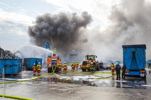 Принти на полотні Firefighters attending to a blaze