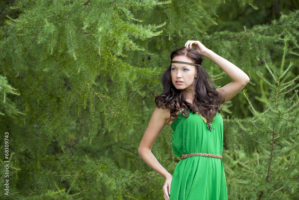 Beautiful young woman in green dress Beautiful young woman in green dress