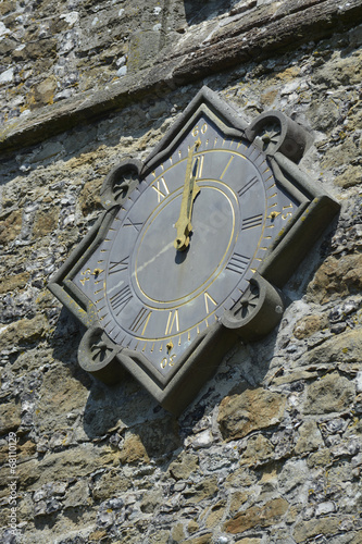 Church Clock at midday photo