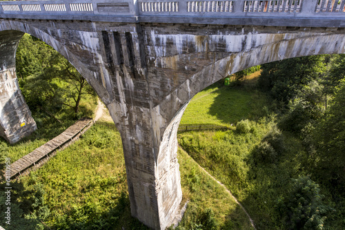 Fototapeta Naklejka Na Ścianę i Meble -  Old concrete railway bridge in Stanczyki, Mazury, Poland