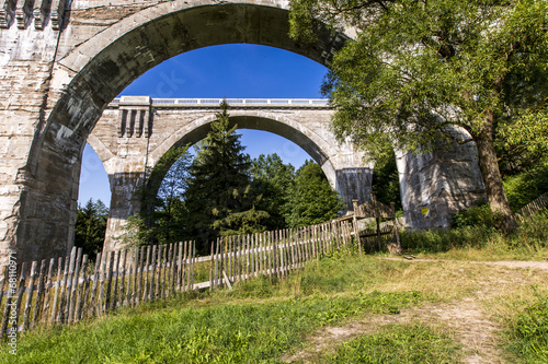 Fototapeta Naklejka Na Ścianę i Meble -  Old concrete railway bridge in Stanczyki, Mazury, Poland