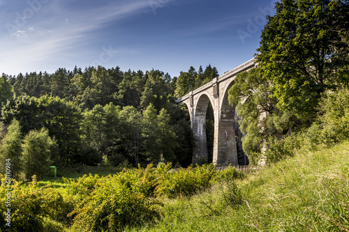 Fototapeta Naklejka Na Ścianę i Meble -  Old concrete railway bridge in Stanczyki, Mazury, Poland