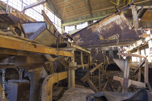 machinery destroyed in a coal mine abandoned after the war