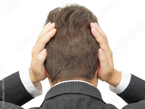 businessman blocking his ears with hands
