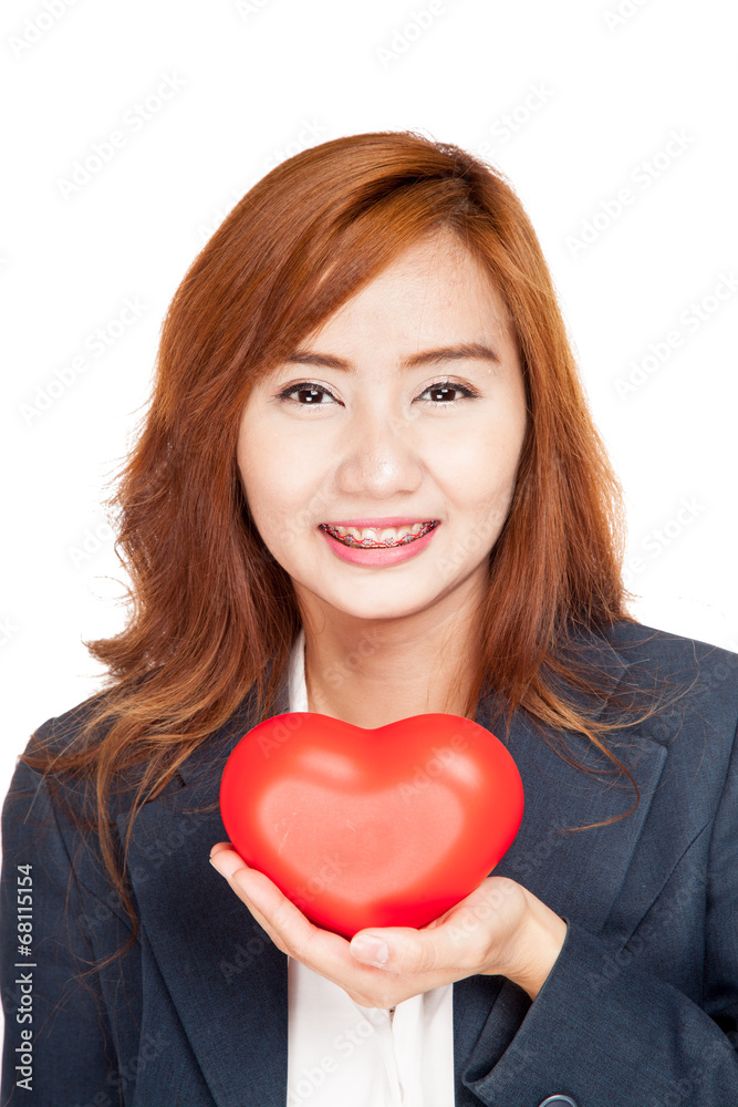 Happy Asian businesswoman show red heart on her palm hand Happy Asian businesswoman show red heart on her palm hand