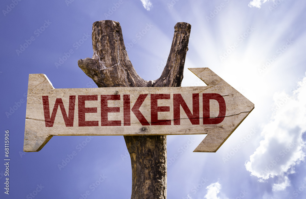 Weekend wooden sign on a beautiful day
