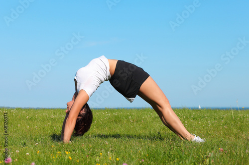 Beautiful Yoga woman Practicing Yoga